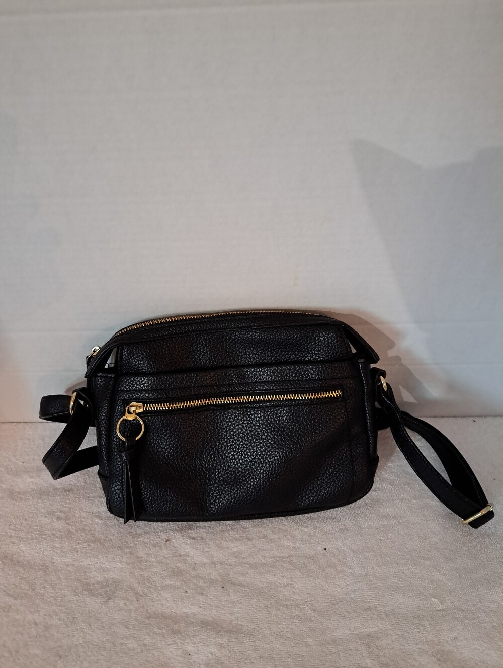 Black Pebbled Crossbody Bag with Gold Hardware